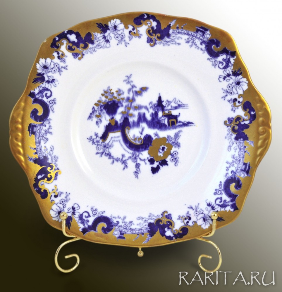 Старинное овальное блюдо "Пагода в цветущем саду" Старинное овальное блюдо "Пагода в цветущем саду"